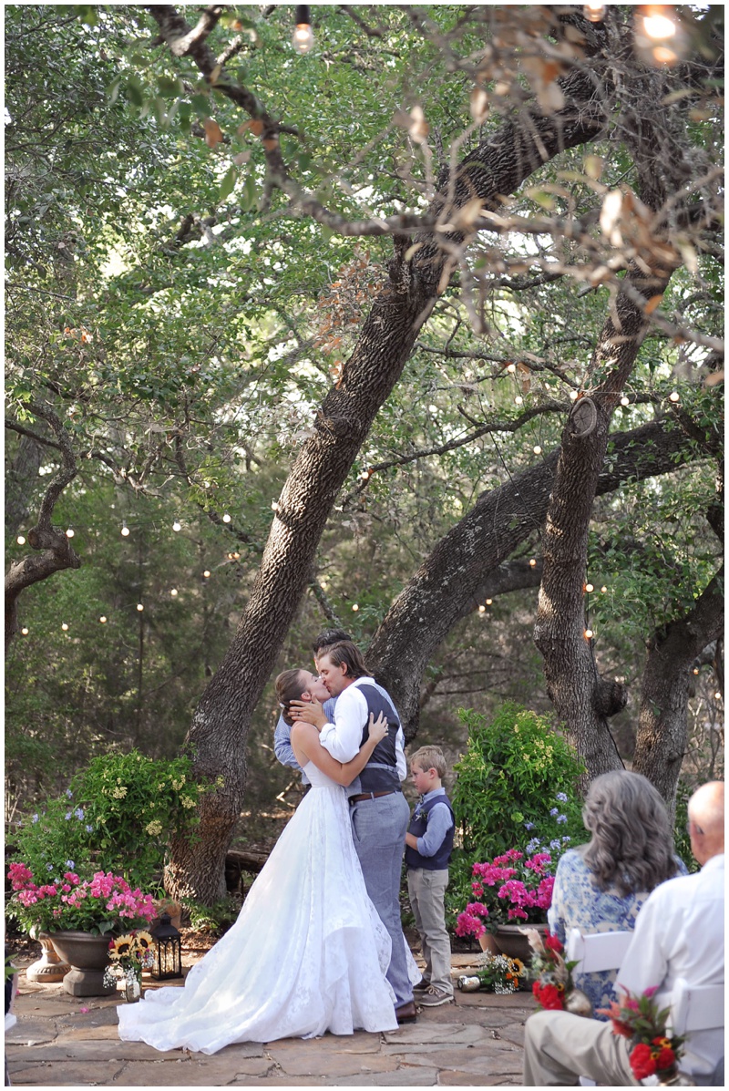 First Kiss as Husband and Wife at the Bluebonnet Barn in Driftwood Texas