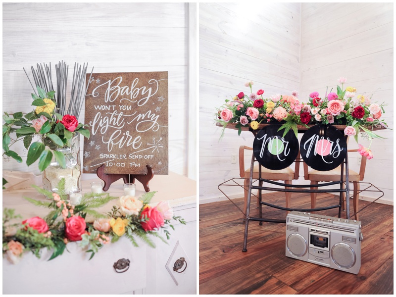 ACL lovers wedding reception details with records as place settings and boomboxes 