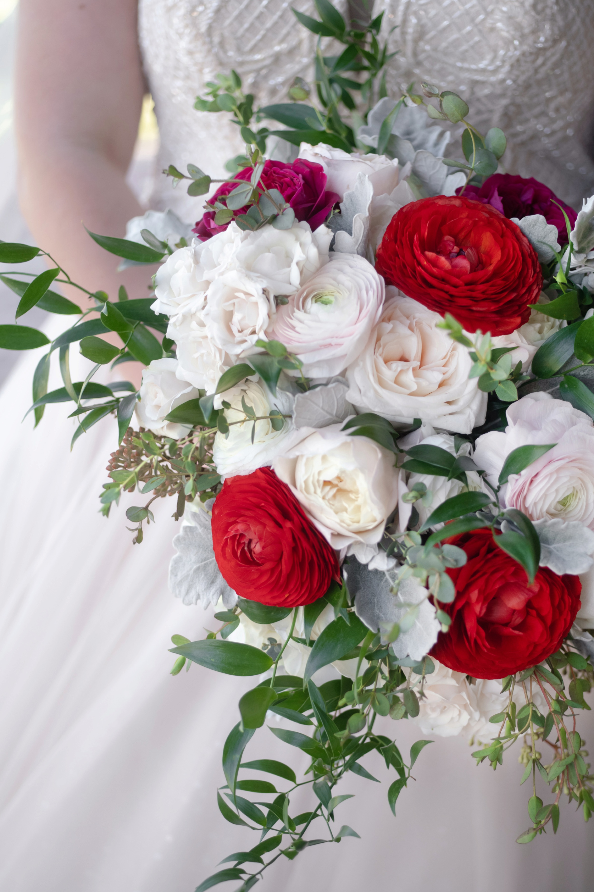 Whim Hospitality Bridal Bouquet with red blooms